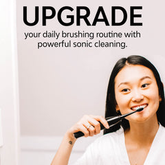 TAO Clean Base Station sanitizing and charging the toothbrush