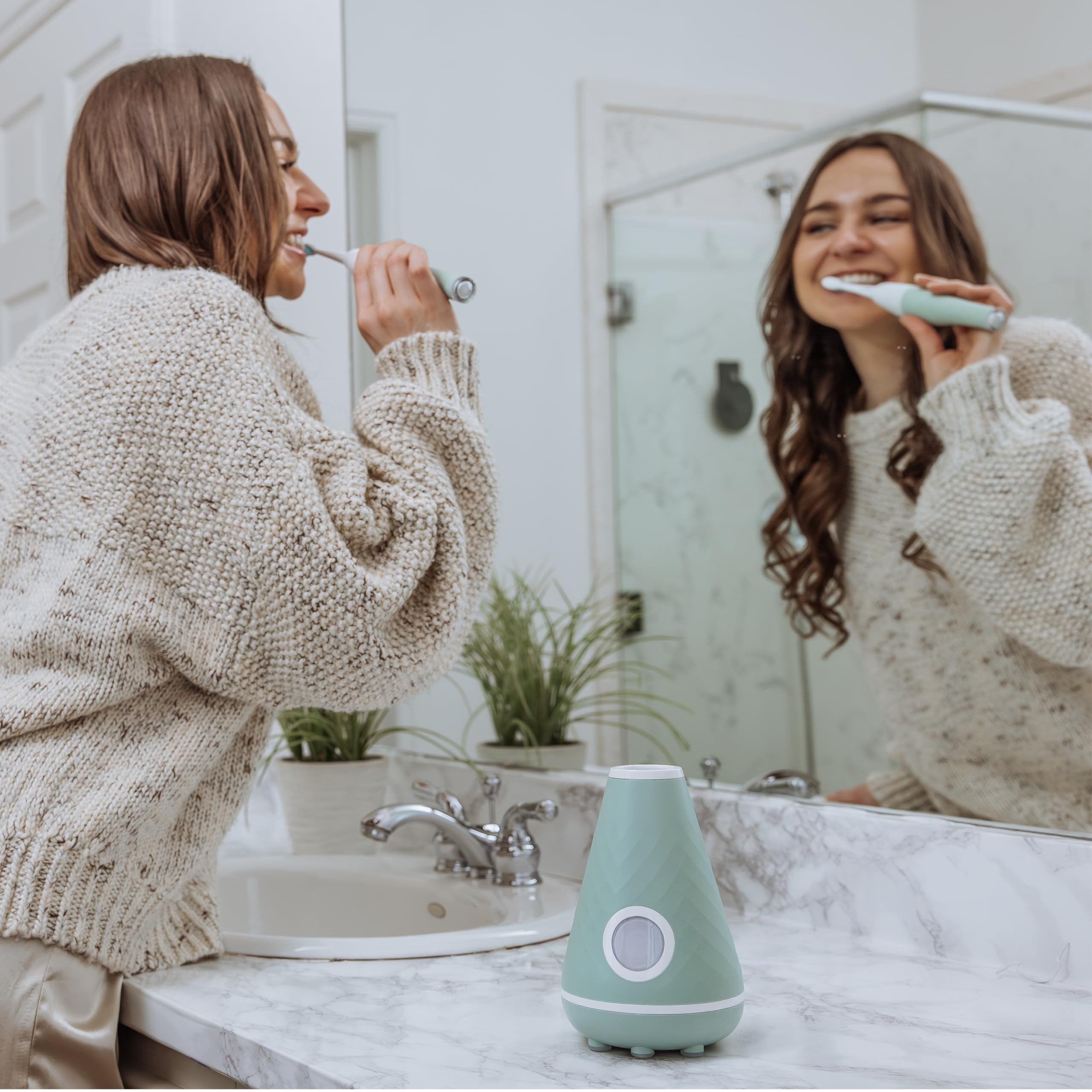 Toothbrush displaying dual speed settings: Super Clean and Sensitive Clean