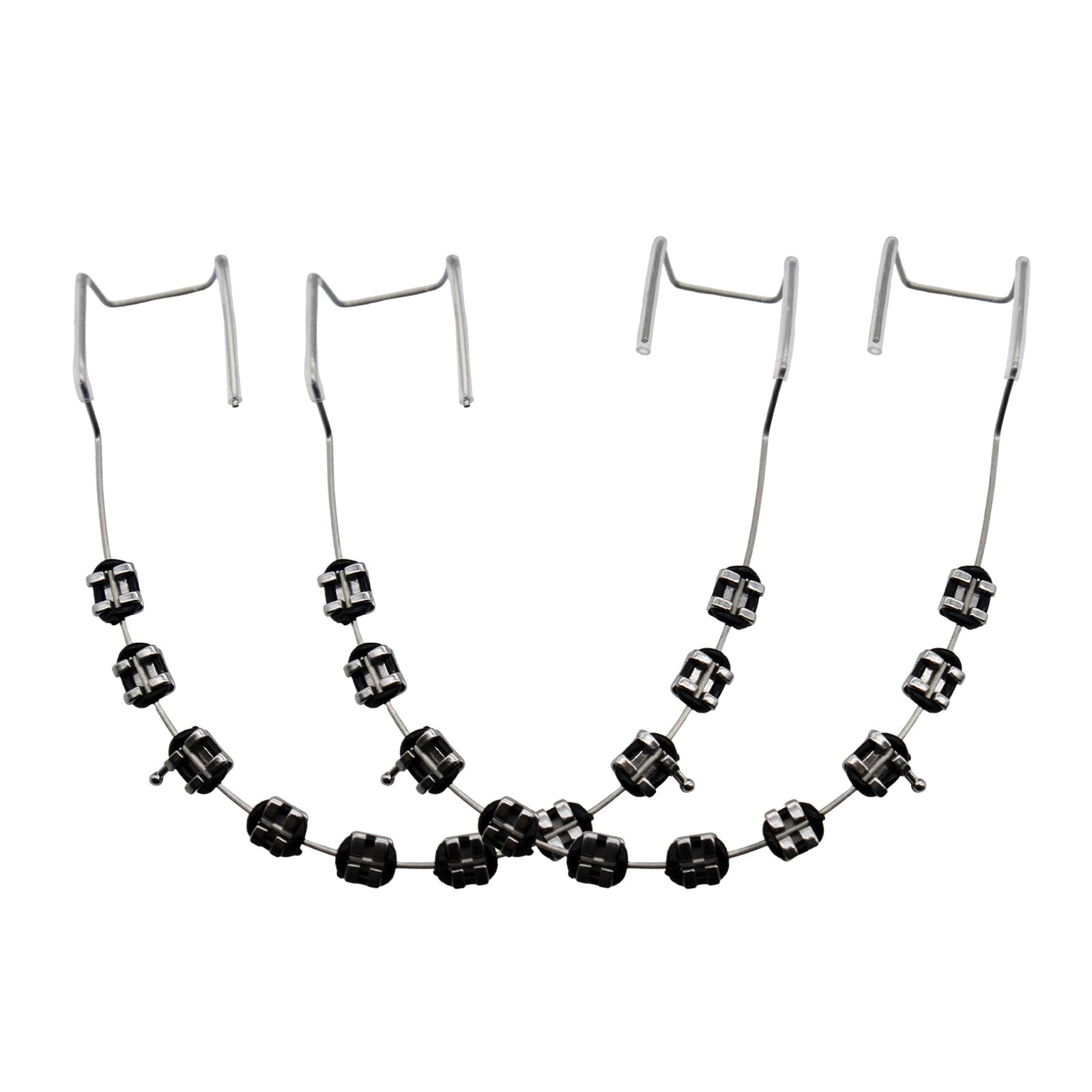 Black fake braces on a dental mold for teaching