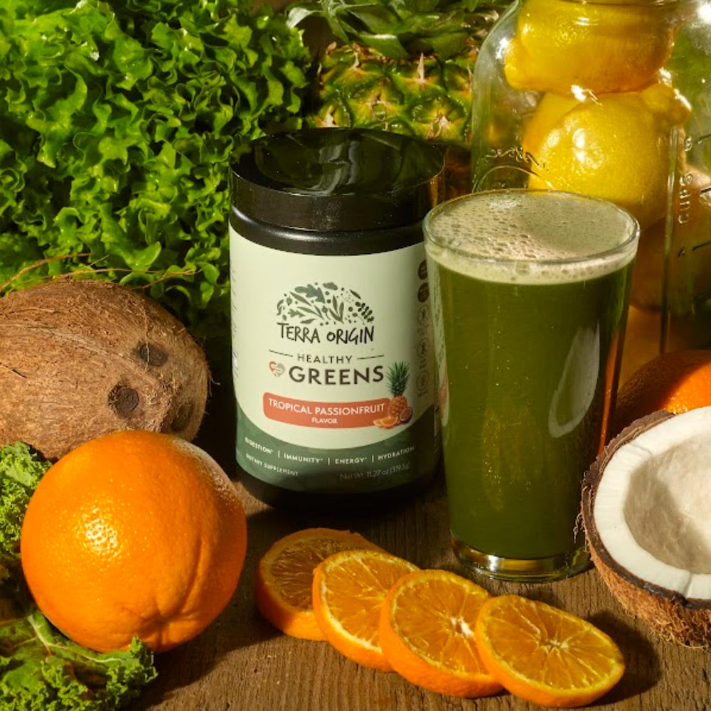 Lifestyle shot of a healthy person enjoying a greens powder smoothie