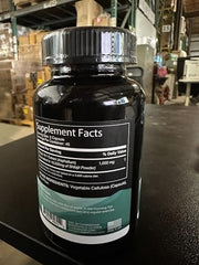 Supplement facts panel and bottle on white background