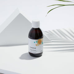 Easy dosing dropper beside the Omega Superb bottle