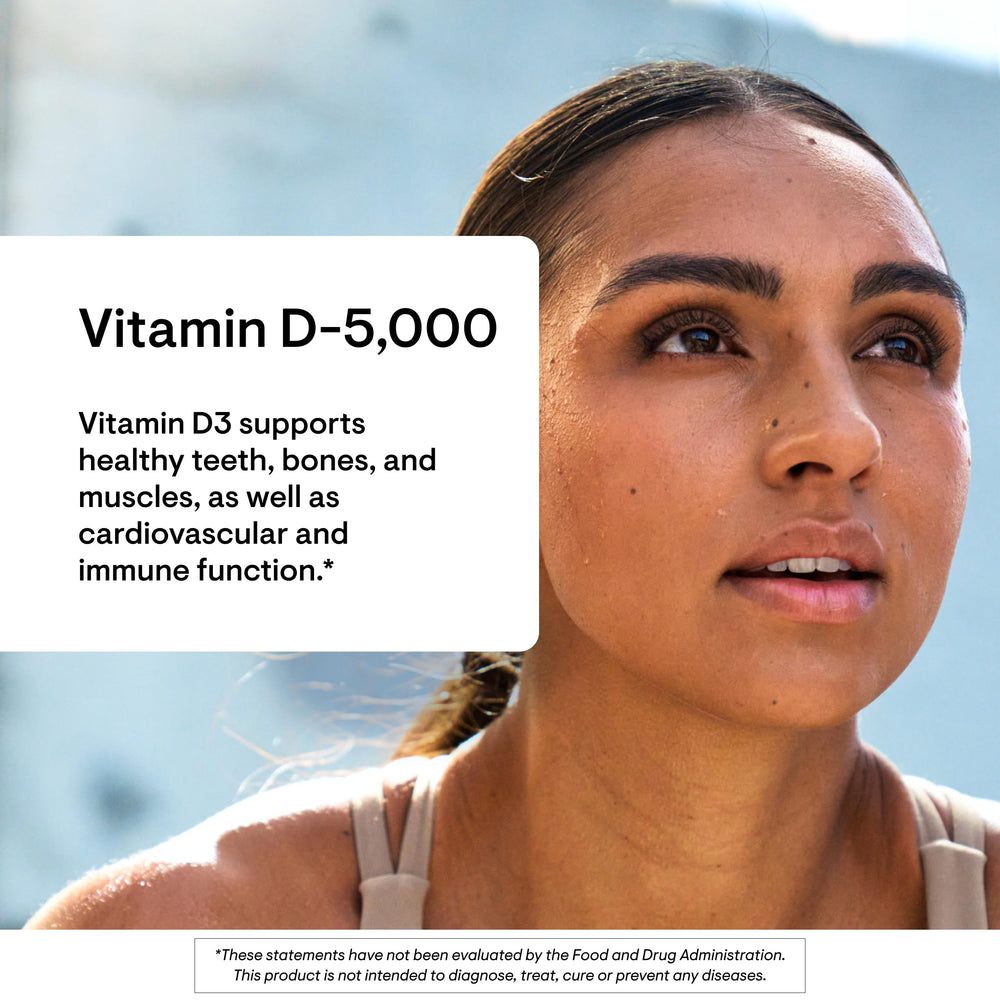 THORNE Vitamin D-5000 capsules close-up showing soft gel capsules for convenient daily intake.