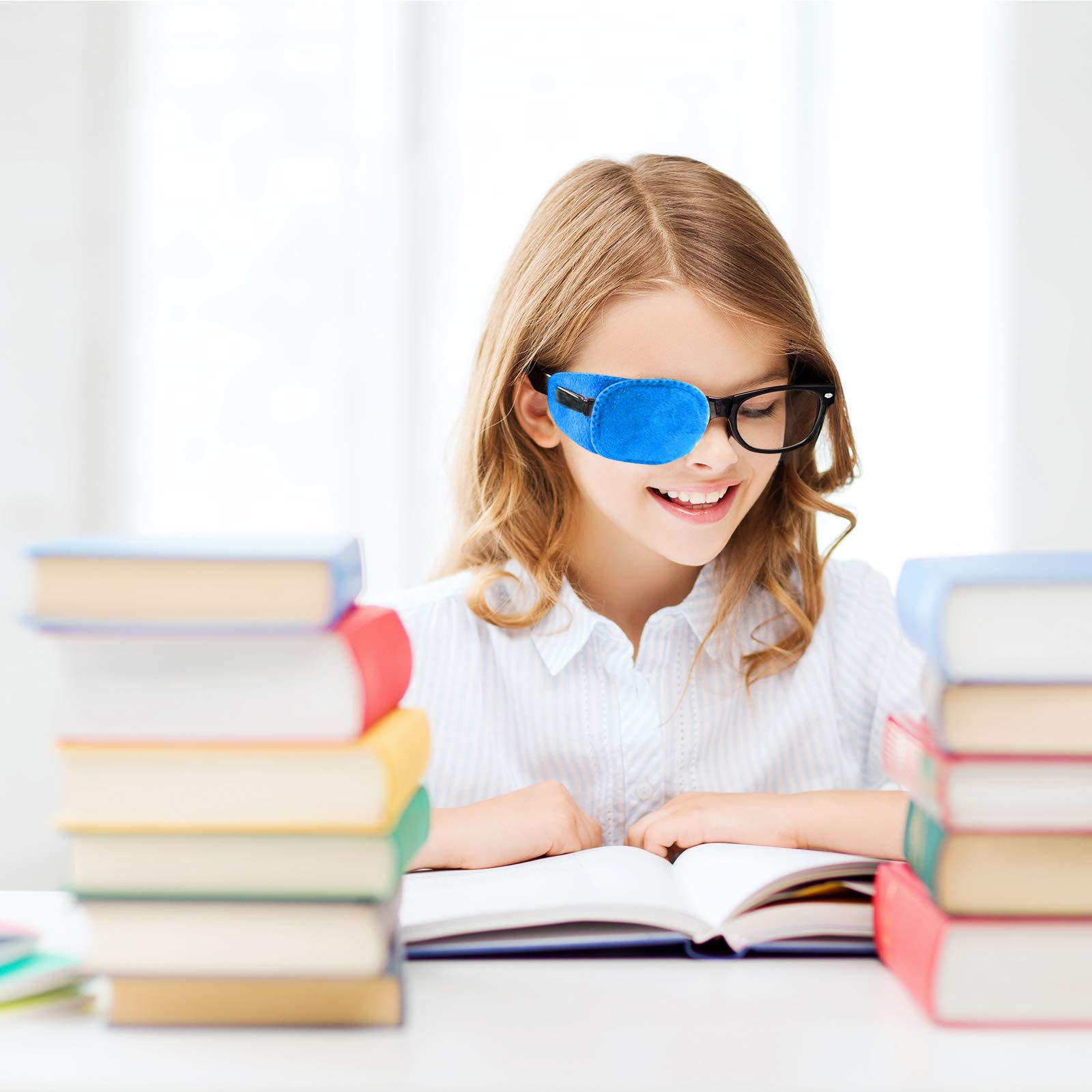 Eye patch attached to glasses on a child’s face
