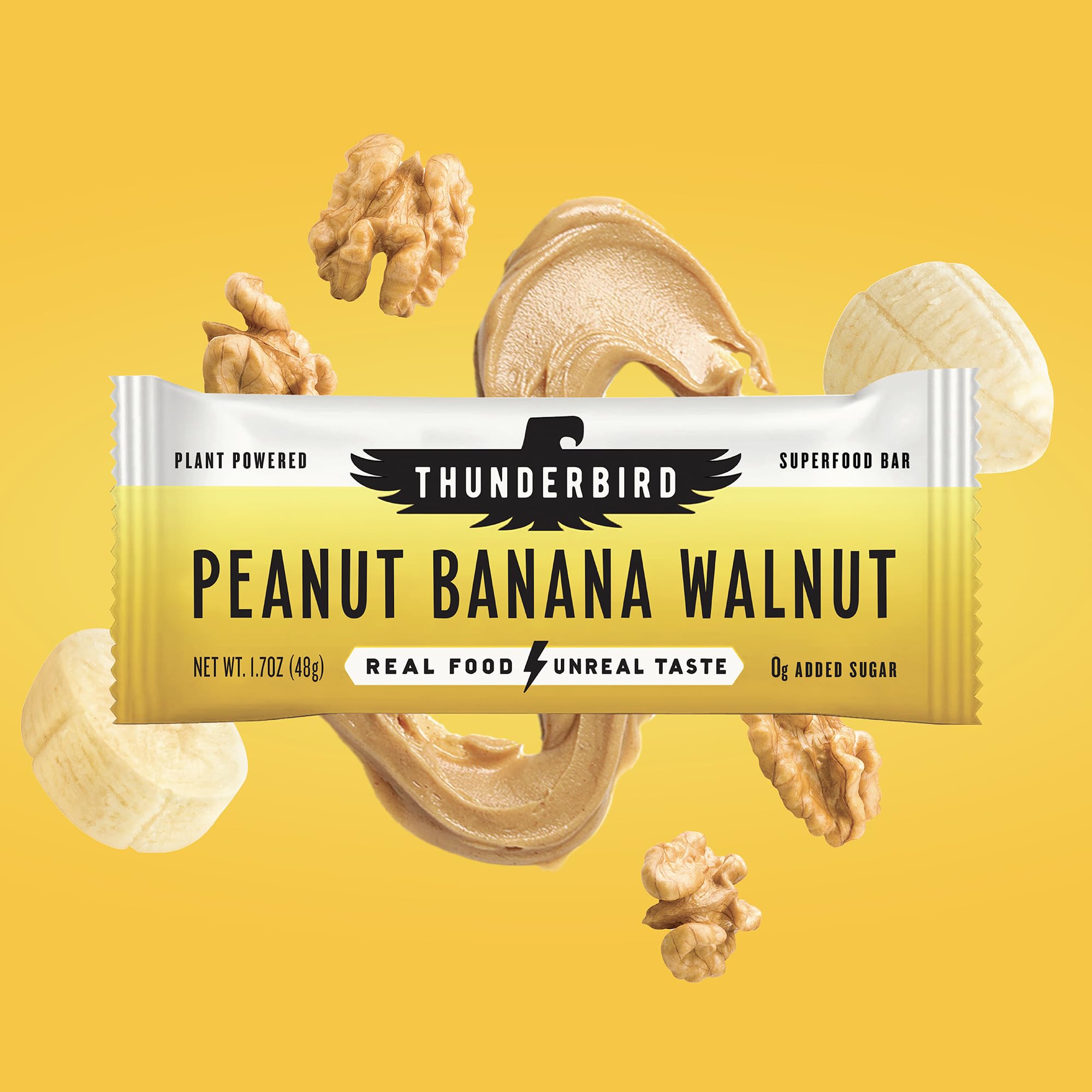 Thunderbird Bars bite-shot shows visible nuts for protein-rich snacking.
