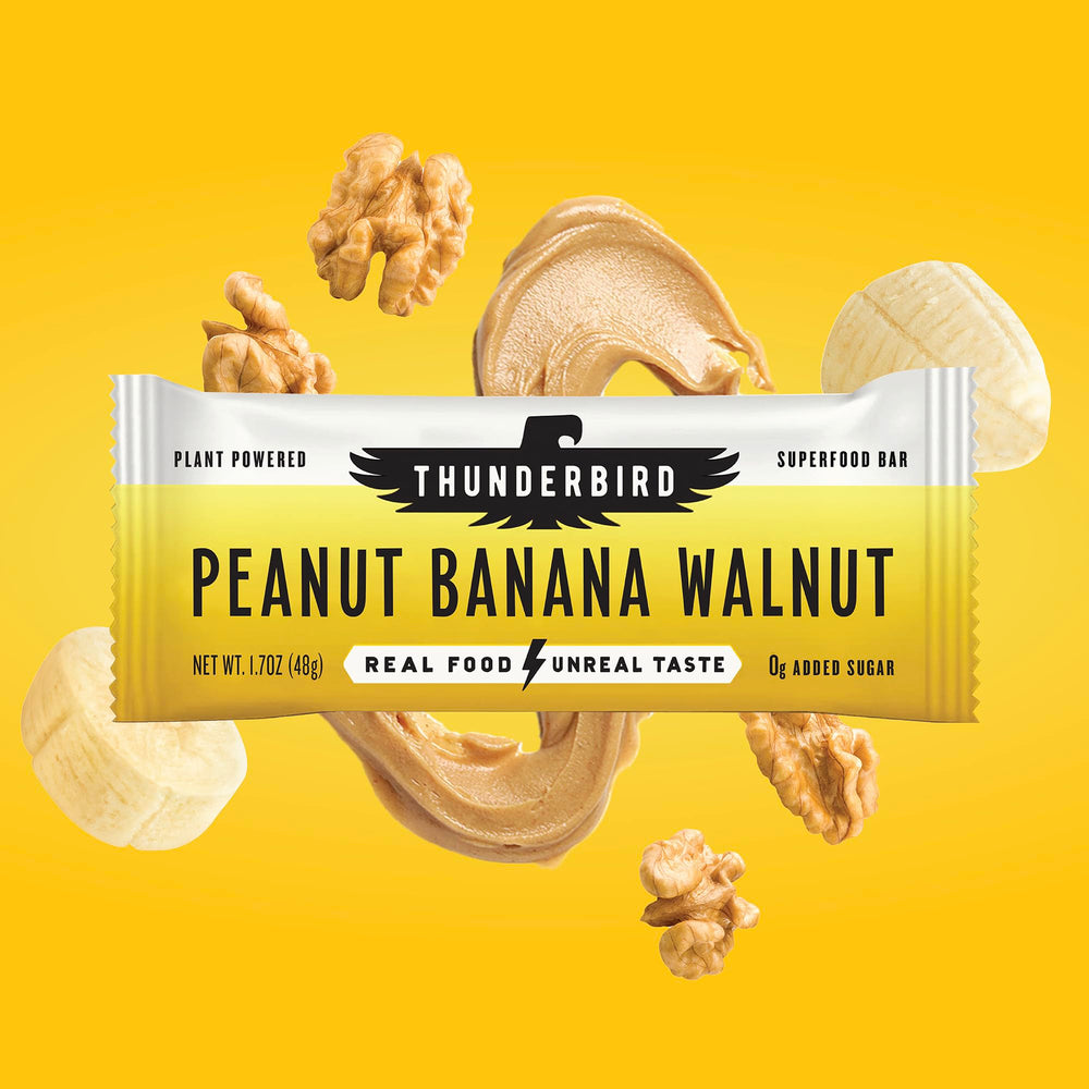 Thunderbird Bars bite-shot shows visible nuts for protein-rich snacking.