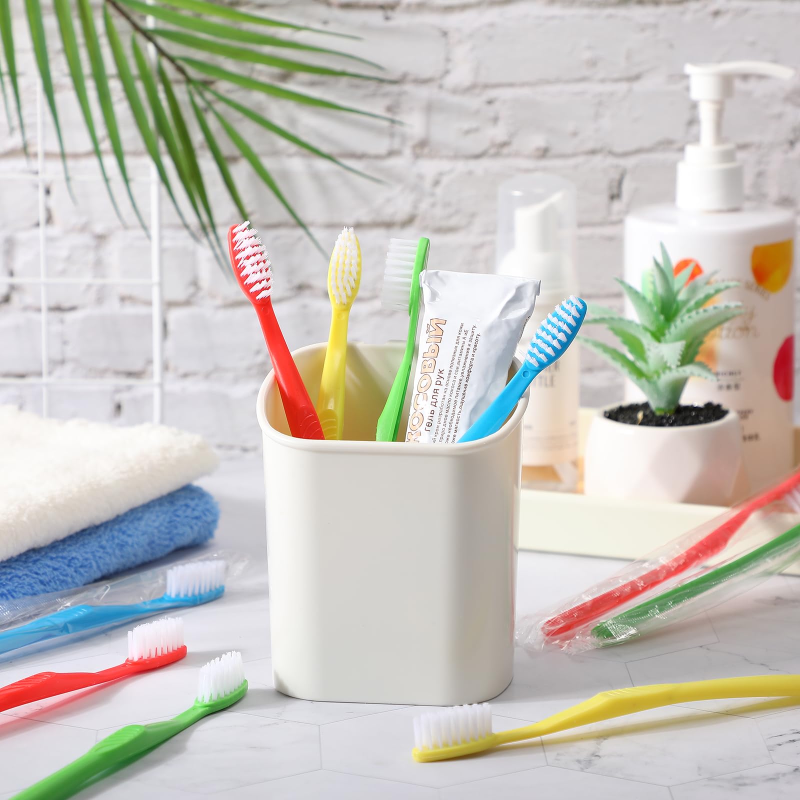 Assorted color toothbrushes with protective wrappers