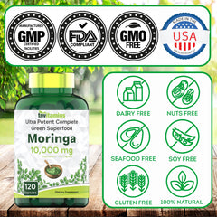 Glass jar of TNVitamins Moringa capsules with scoop