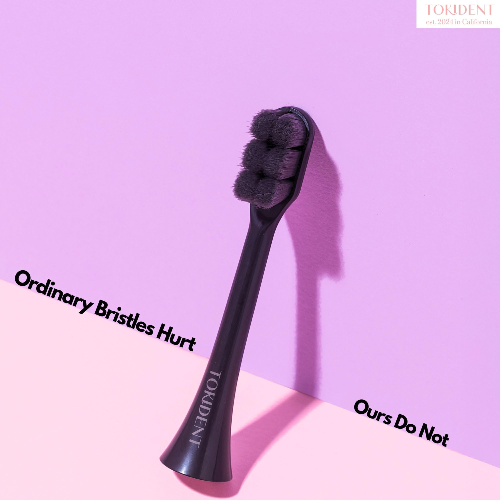 Charcoal black packaging and product presentation for Tokident replacement heads
