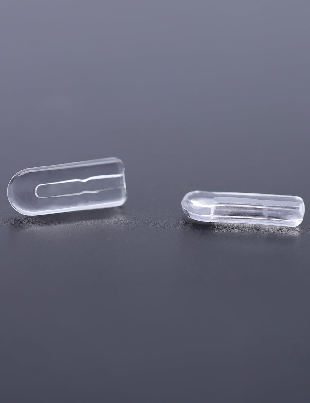 Box showing 20 pairs of Tolaxy plug-in nose pads