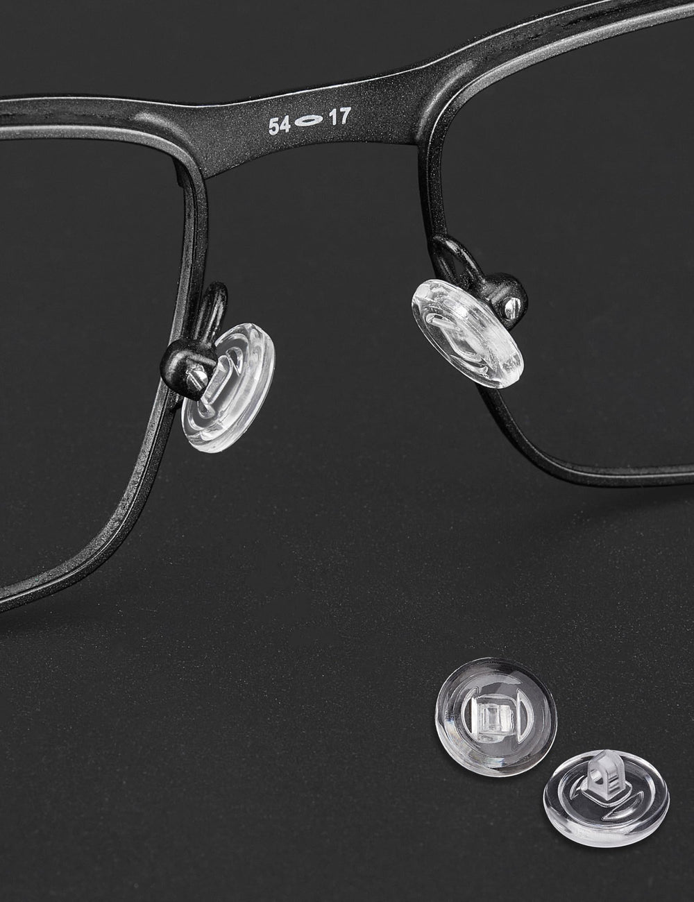 Close-up of Tolaxy screw-in nose pads for Oakley Conductor sunglasses