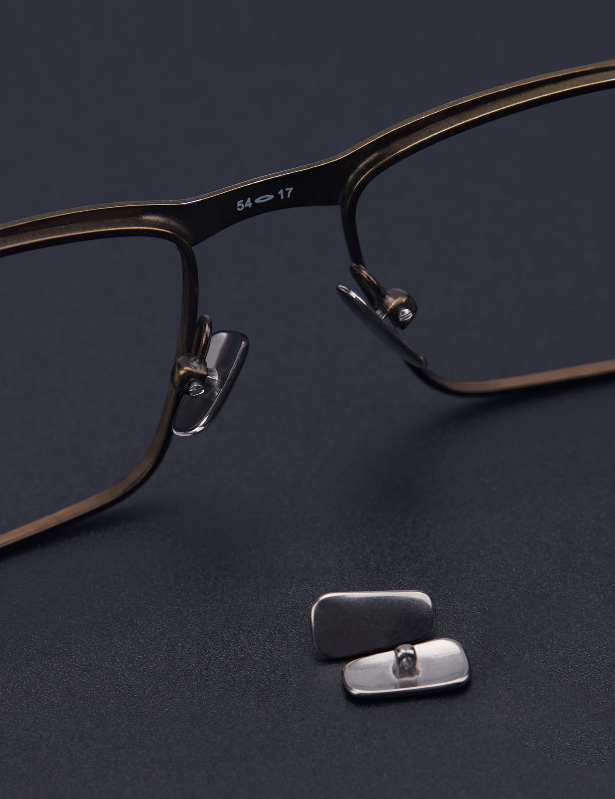 Close-up of Tolaxy metal nose pads on Oakley Tincup OX3184