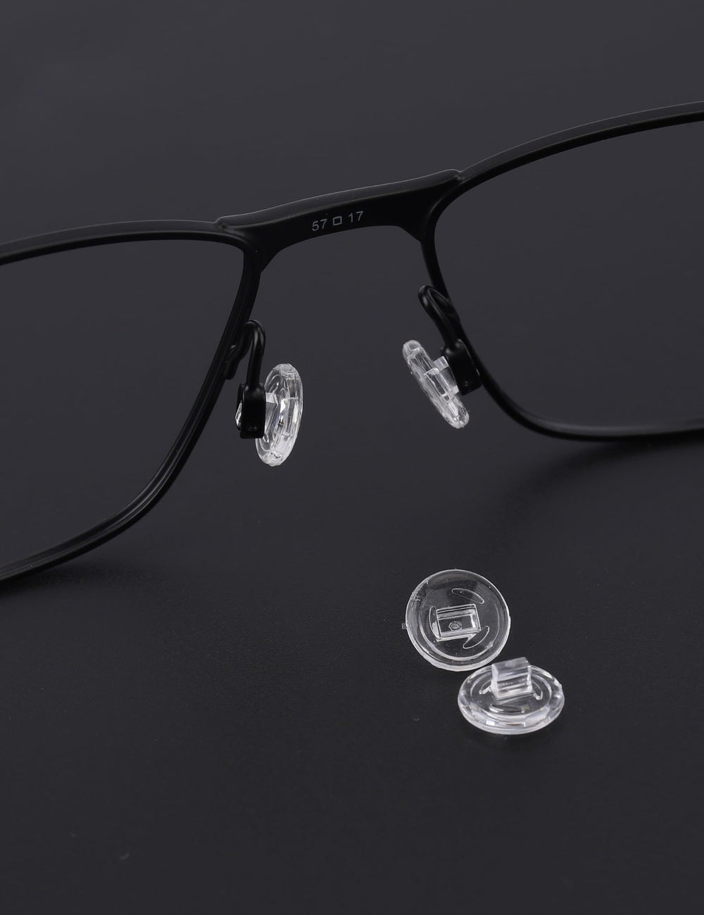 Close-up view of 9mm x 9mm clear silicone nose pad