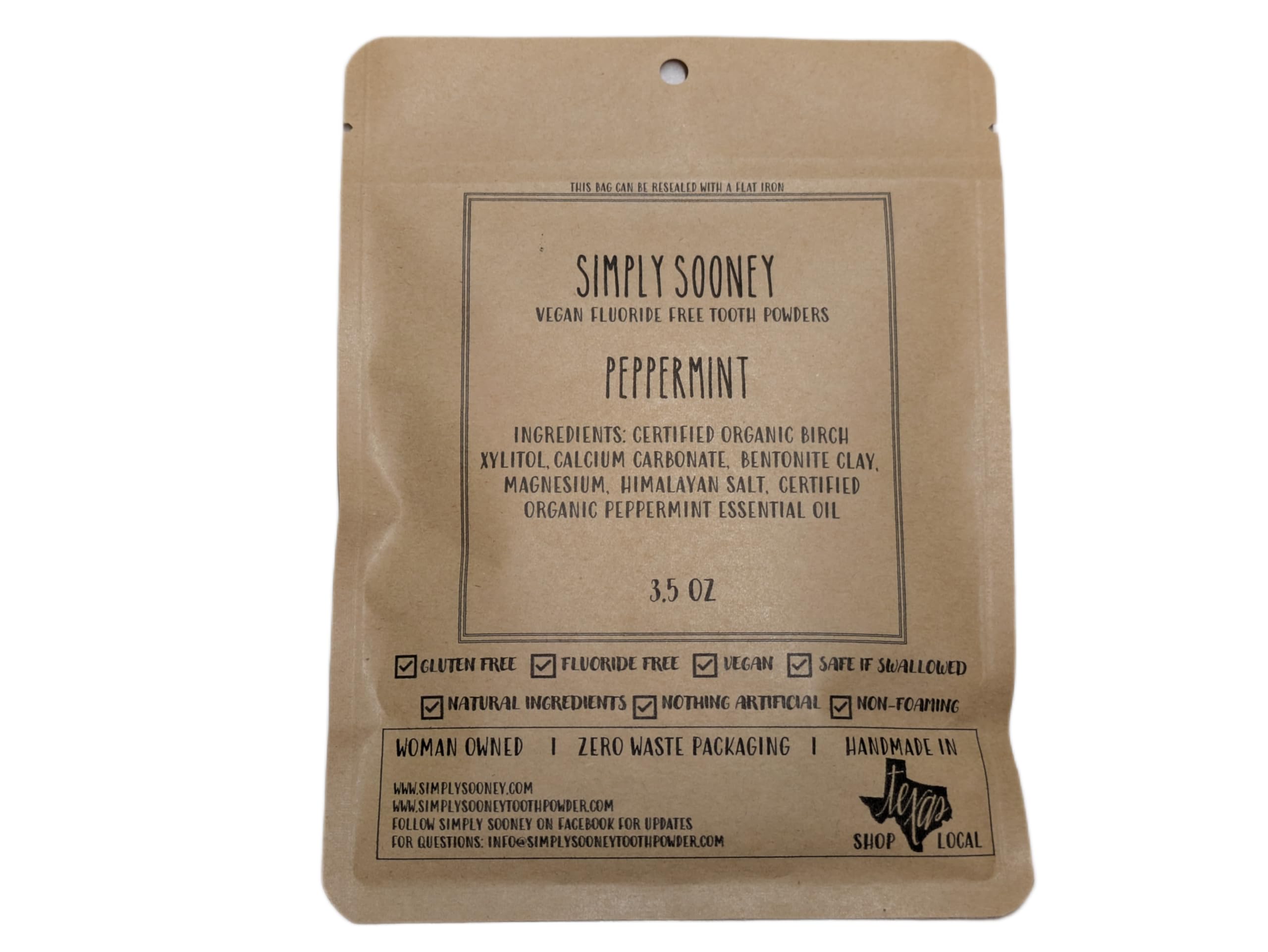 Zero waste peppermint tooth powder in a jar with packaging-free presentation.