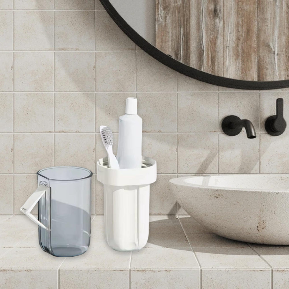 Travel case storing toothbrush, toothpaste, and small essentials