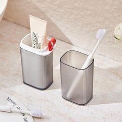 Open Topavatop travel case showing toothbrush and rinse cup