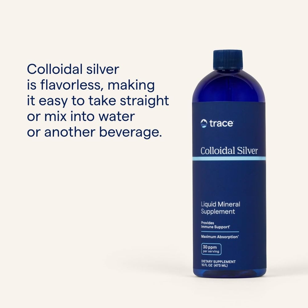 Crystal clear colloidal silver liquid in a glass with dropper