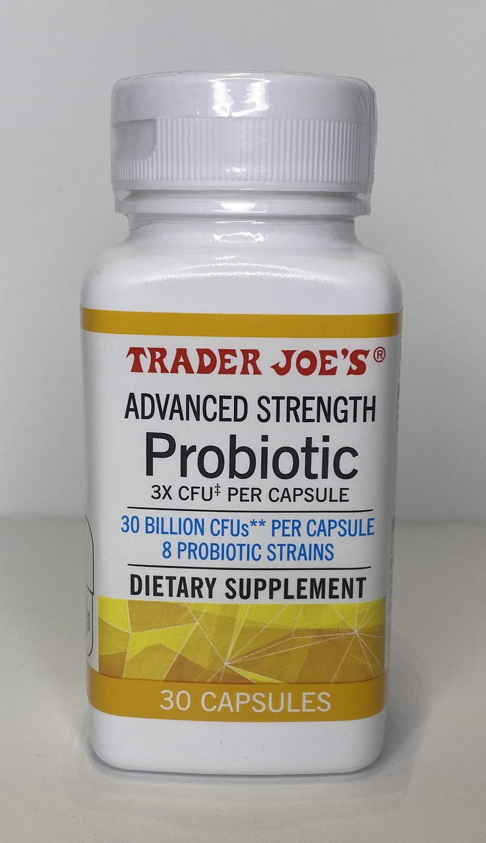 Lifestyle shot of Trader Joe's Advanced Strength Probiotic on a kitchen counter