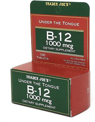 Tablets arranged next to Trader Joe's B-12 bottle showing 100 tablets