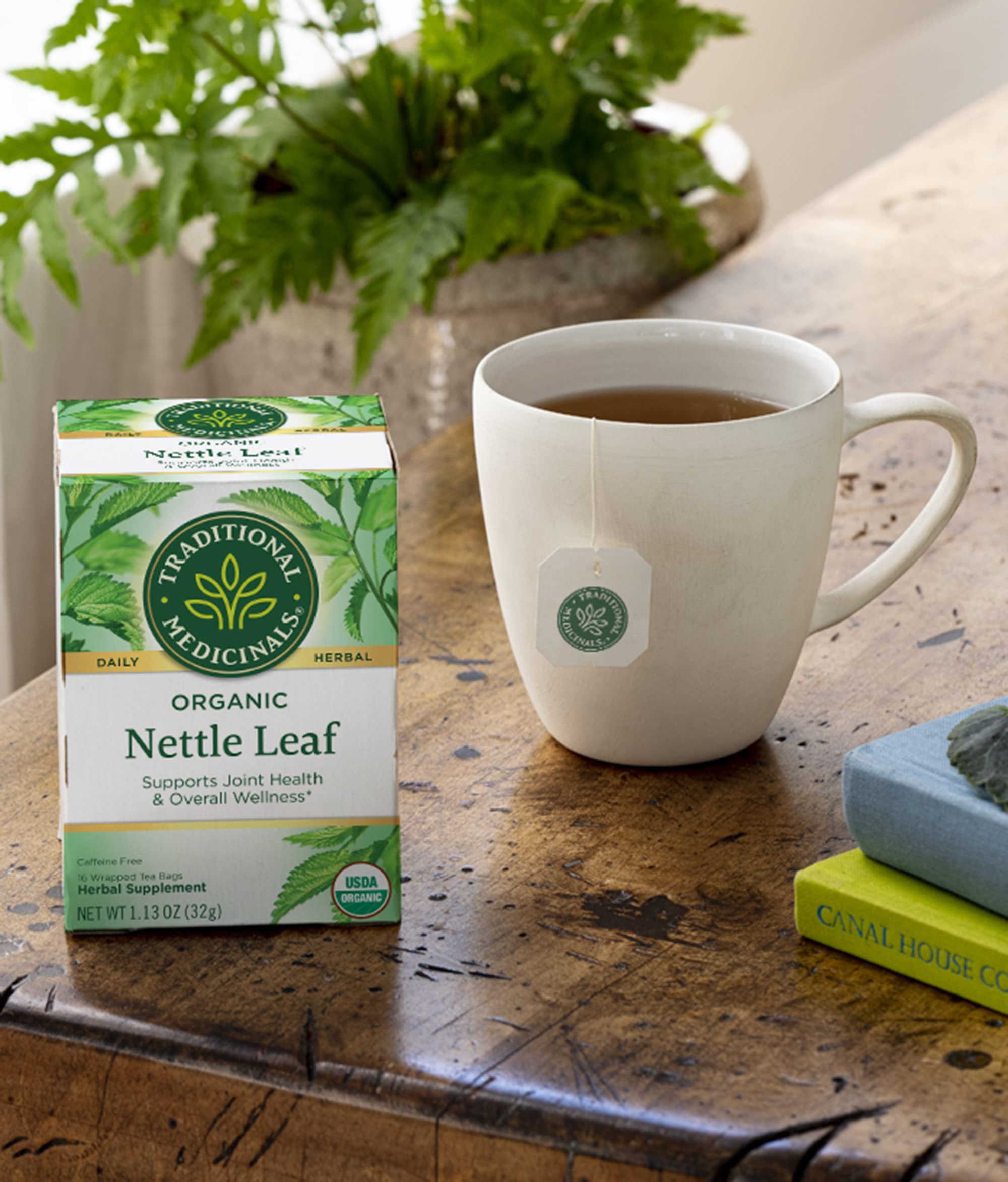 Wellness concept with nettle tea and herbs