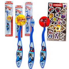 Transformers toothbrush kit for kids with three Optimus Prime brushes and collectible caps