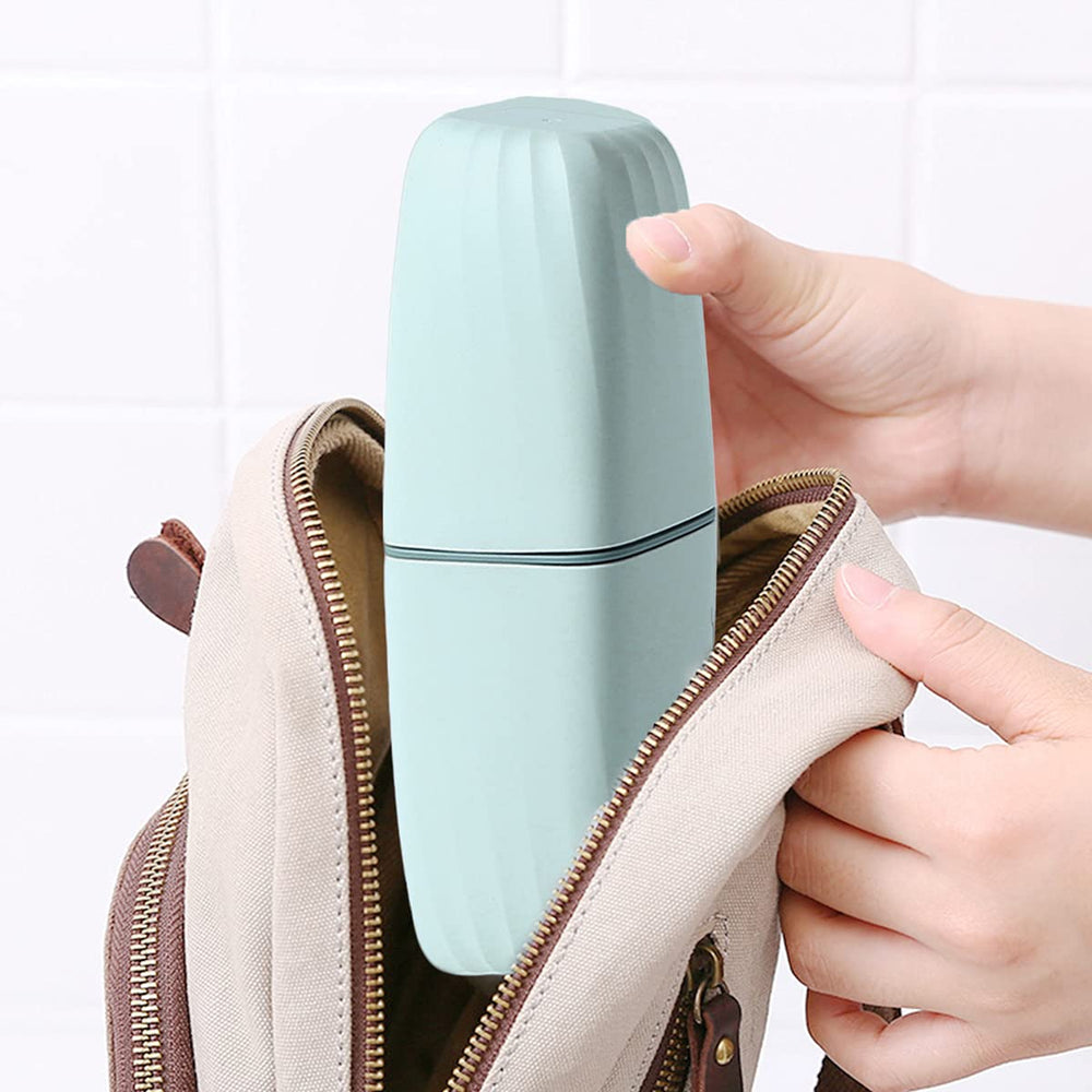 Two-section travel toothbrush holder with attachment ring