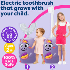 Child using Trueocity U-shaped toothbrush with silicone head