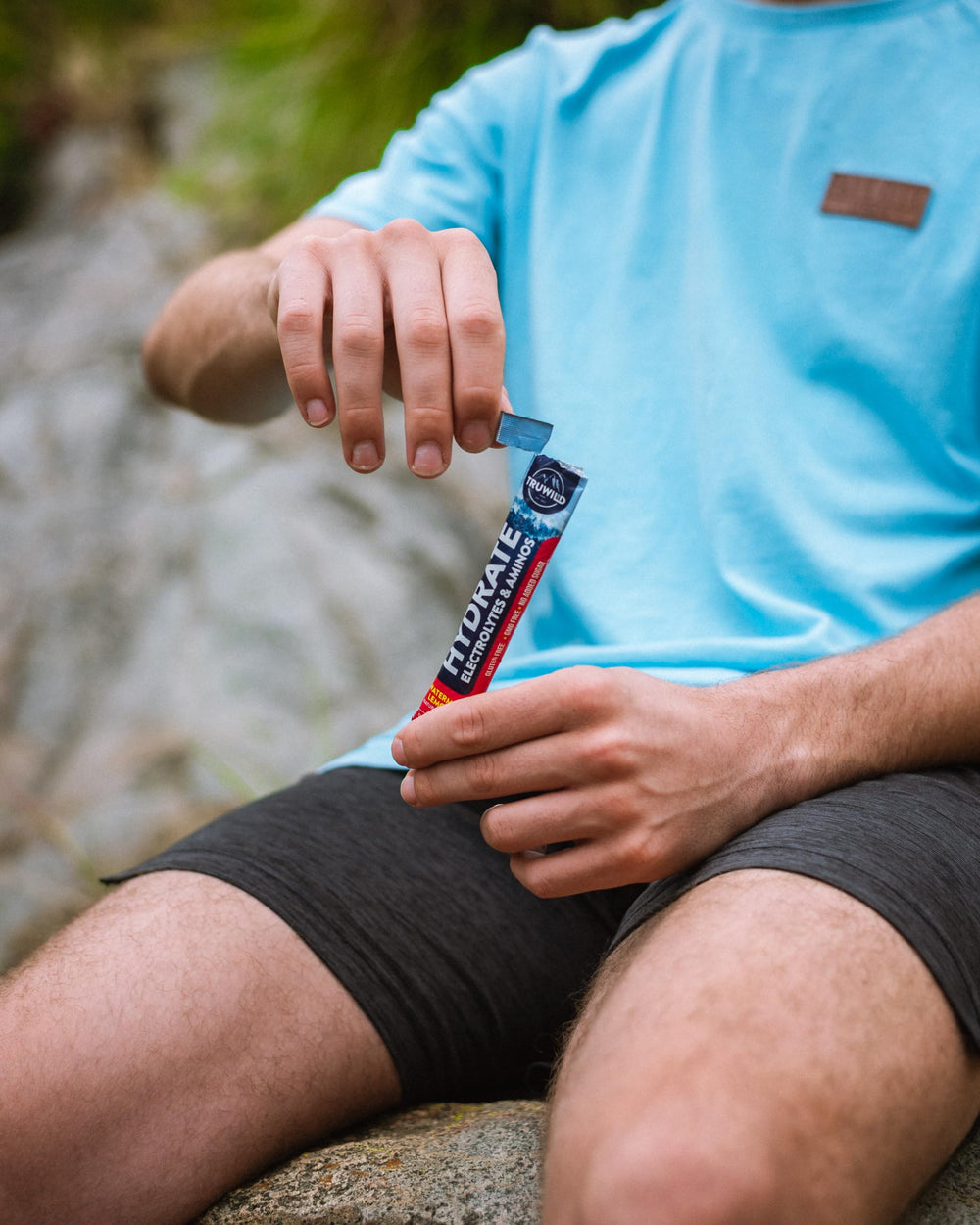 Athlete using TruWild Hydrate during training for hydration support