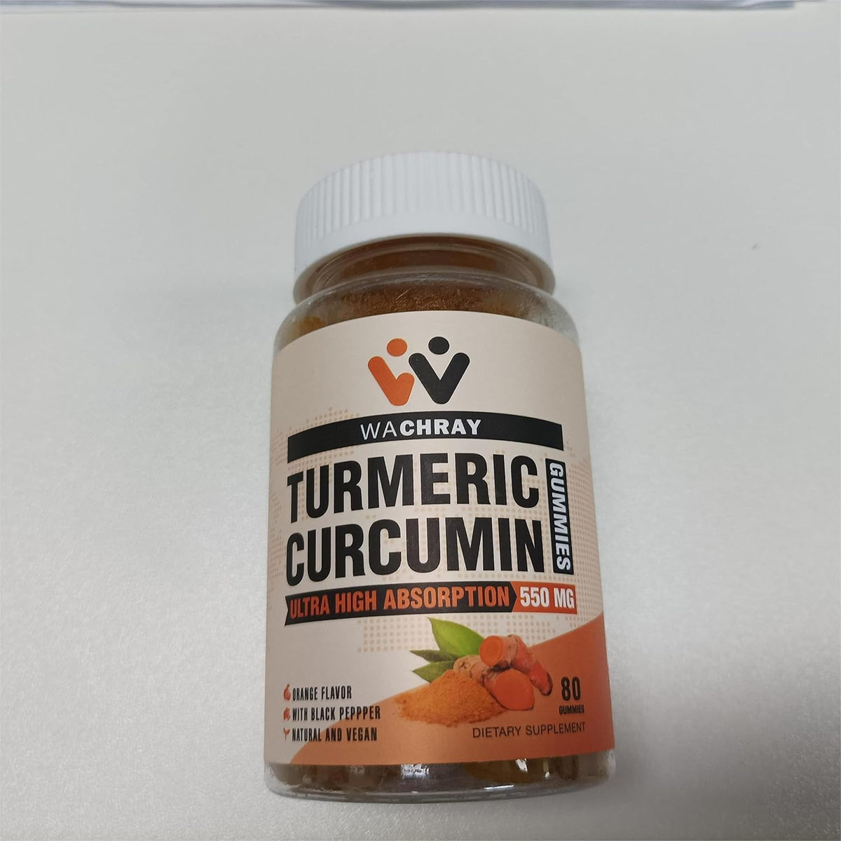 Turmeric Curcumin Gummies with Ginger & Black Pepper Extract – bottle and gummies