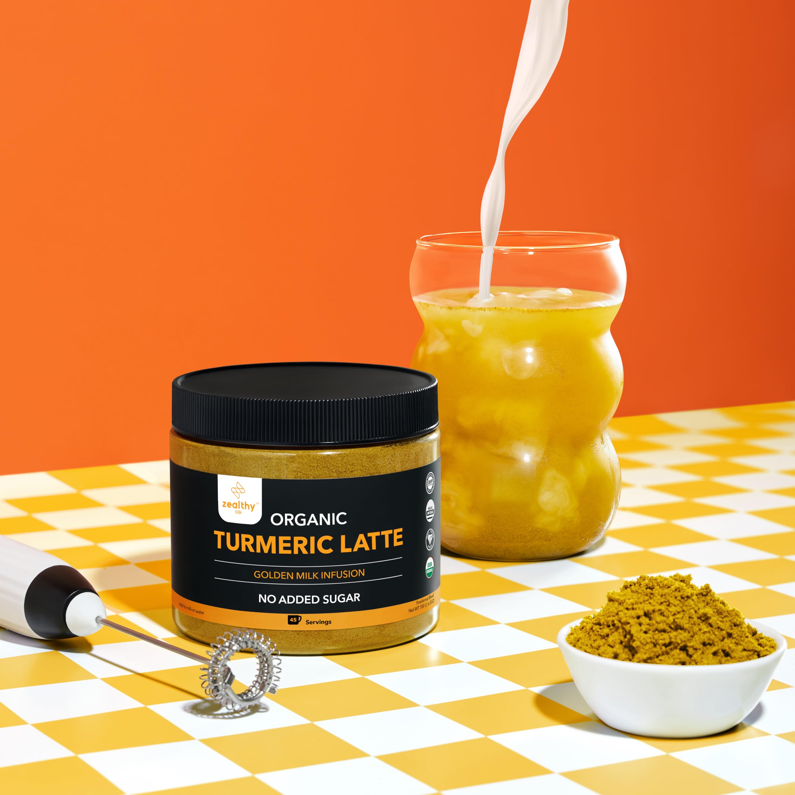 Turmeric latte powder added to coffee for a creamy beverage