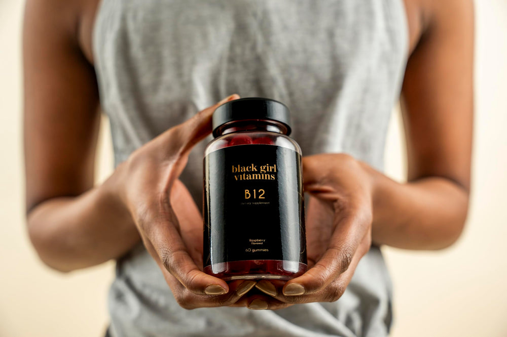 Two Raspberry-flavored B12 Gummies on a white surface