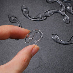 Nose pads attached to eyeglasses frame