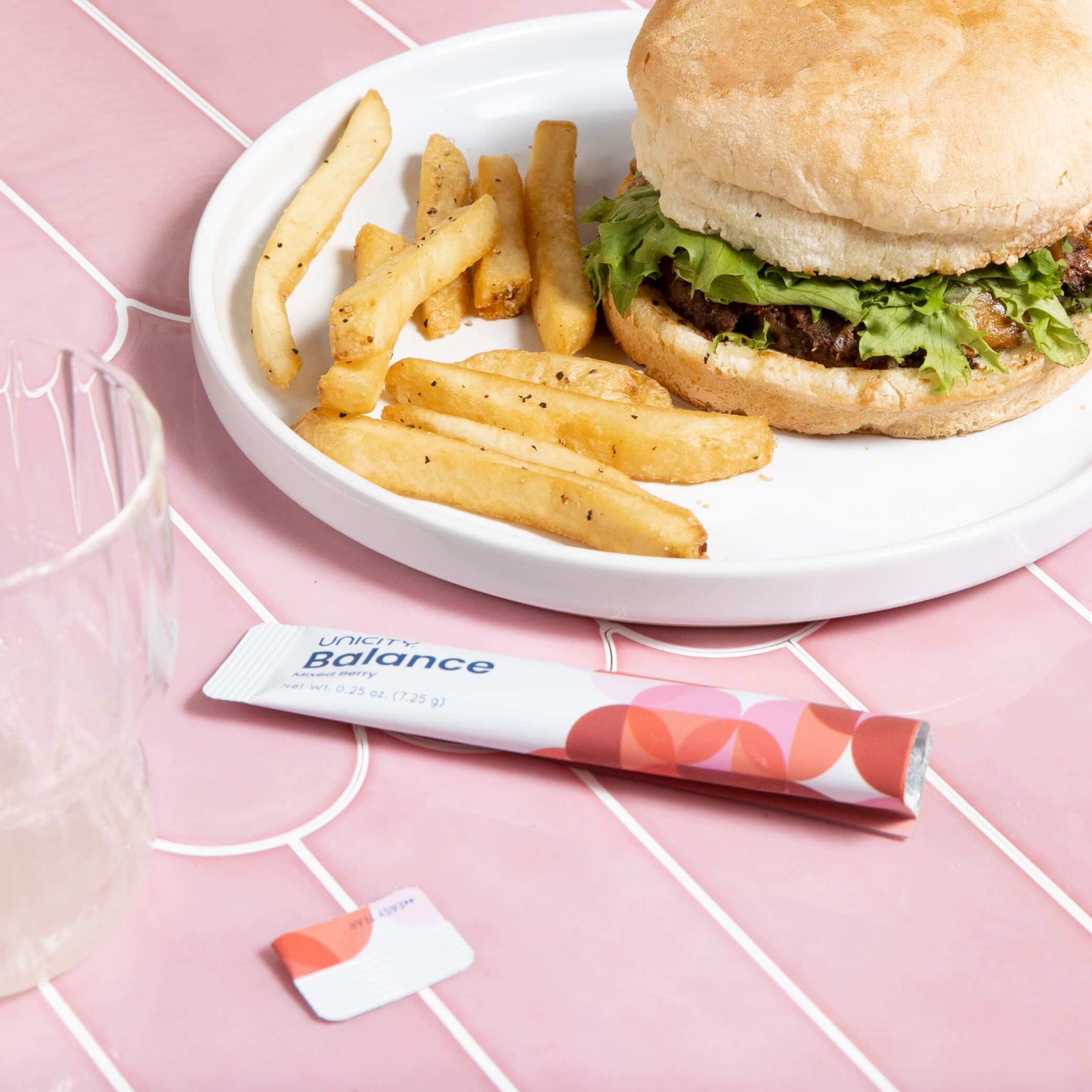 Lifestyle image featuring Unicity Balance Mixed Berry Stick Packs