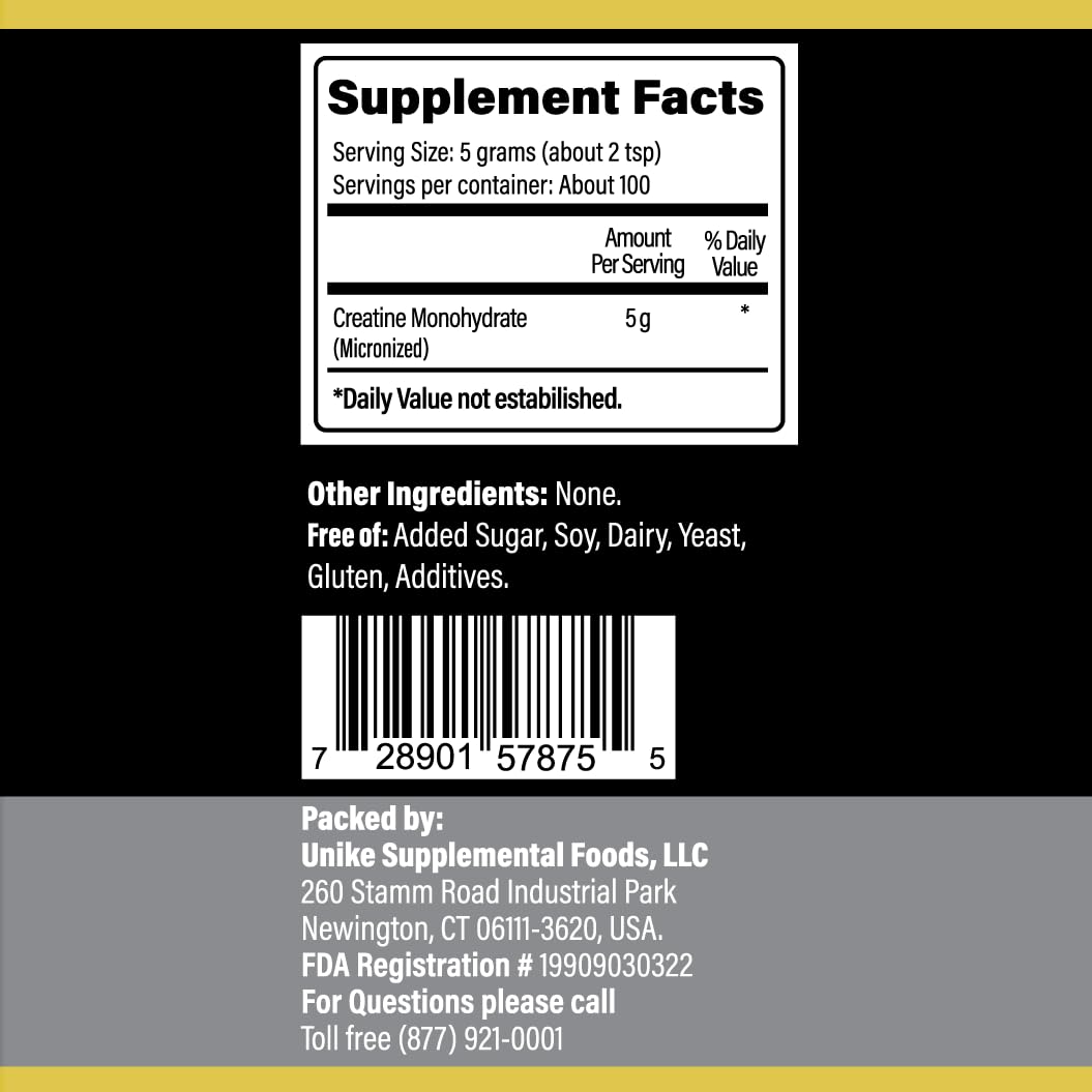 Creatine powder being poured into a shaker