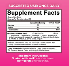 Dropper dispensing probiotic liquid from Tropical Oasis bottle