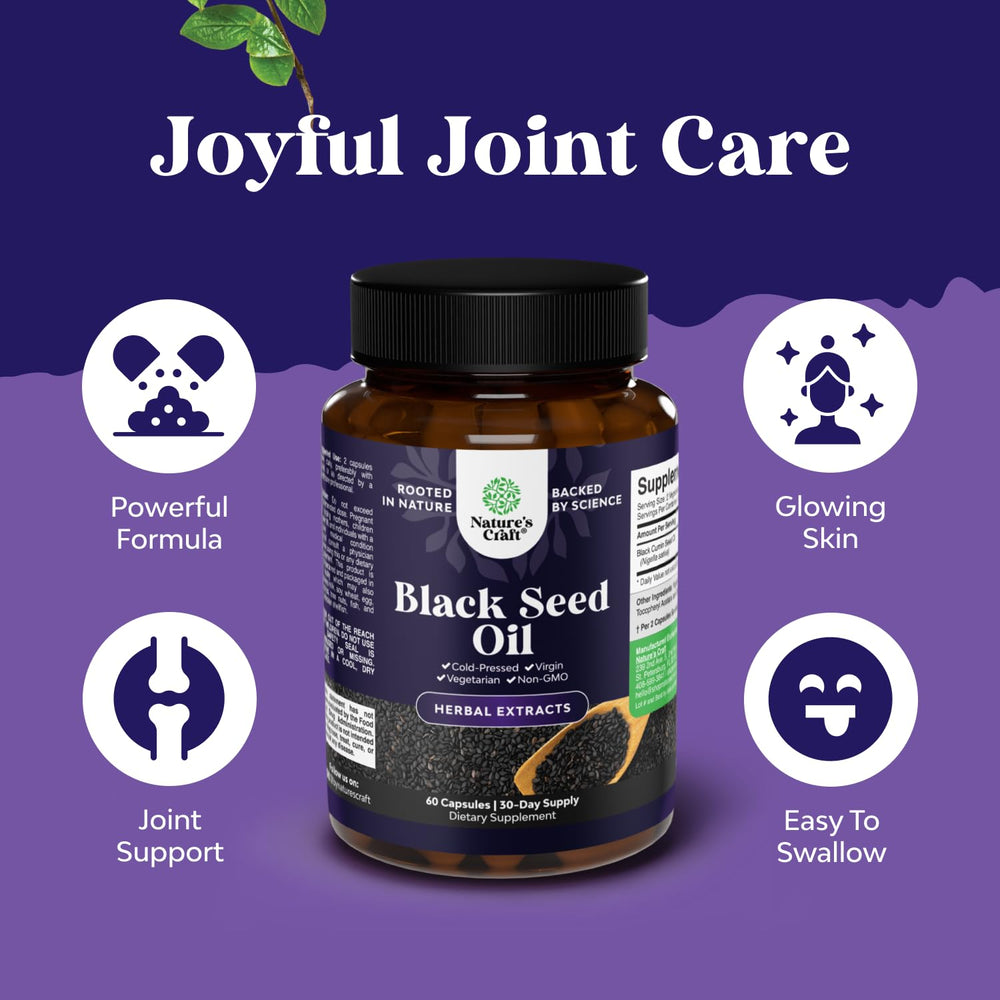 Cold-pressed black seed oil capsules on white background