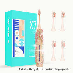 Pink toothbrush with diamond decor on handle