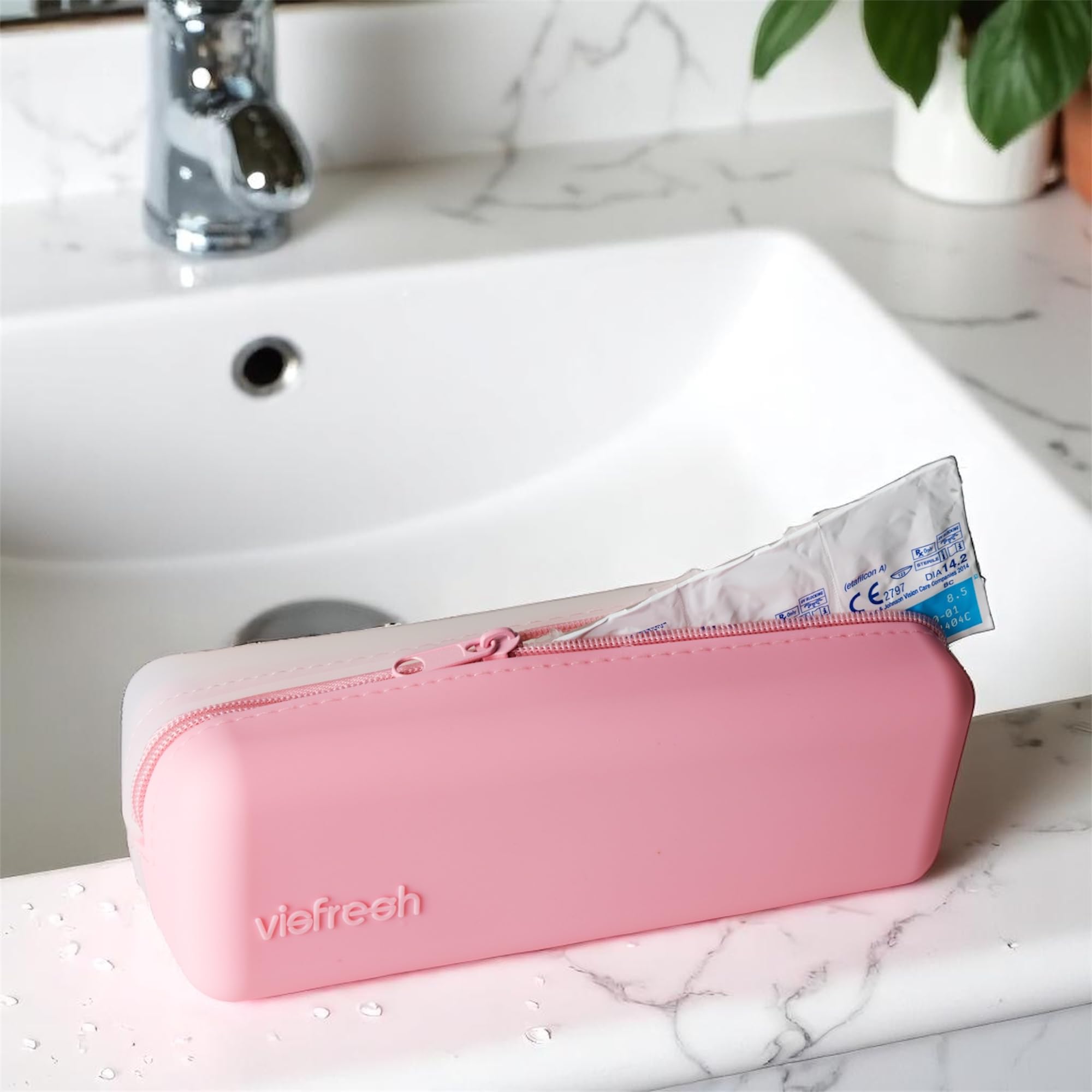 Travel-ready silicone storage case for contact lenses in pink