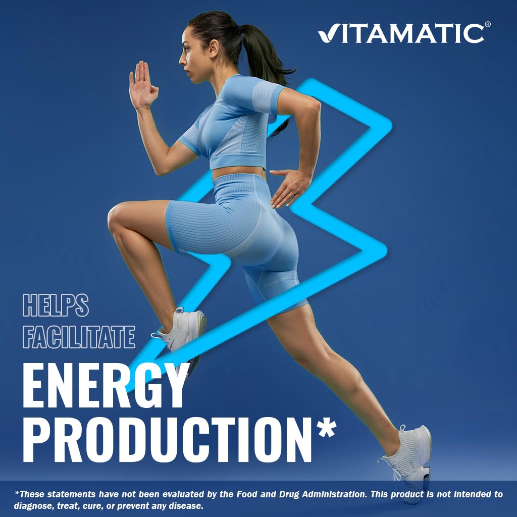 Hand holding Vitamatic B12 tablet ready for use