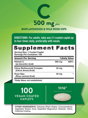 Close-up of a single coated caplet showing 500 mg Vitamin C from Ascorbic Acid