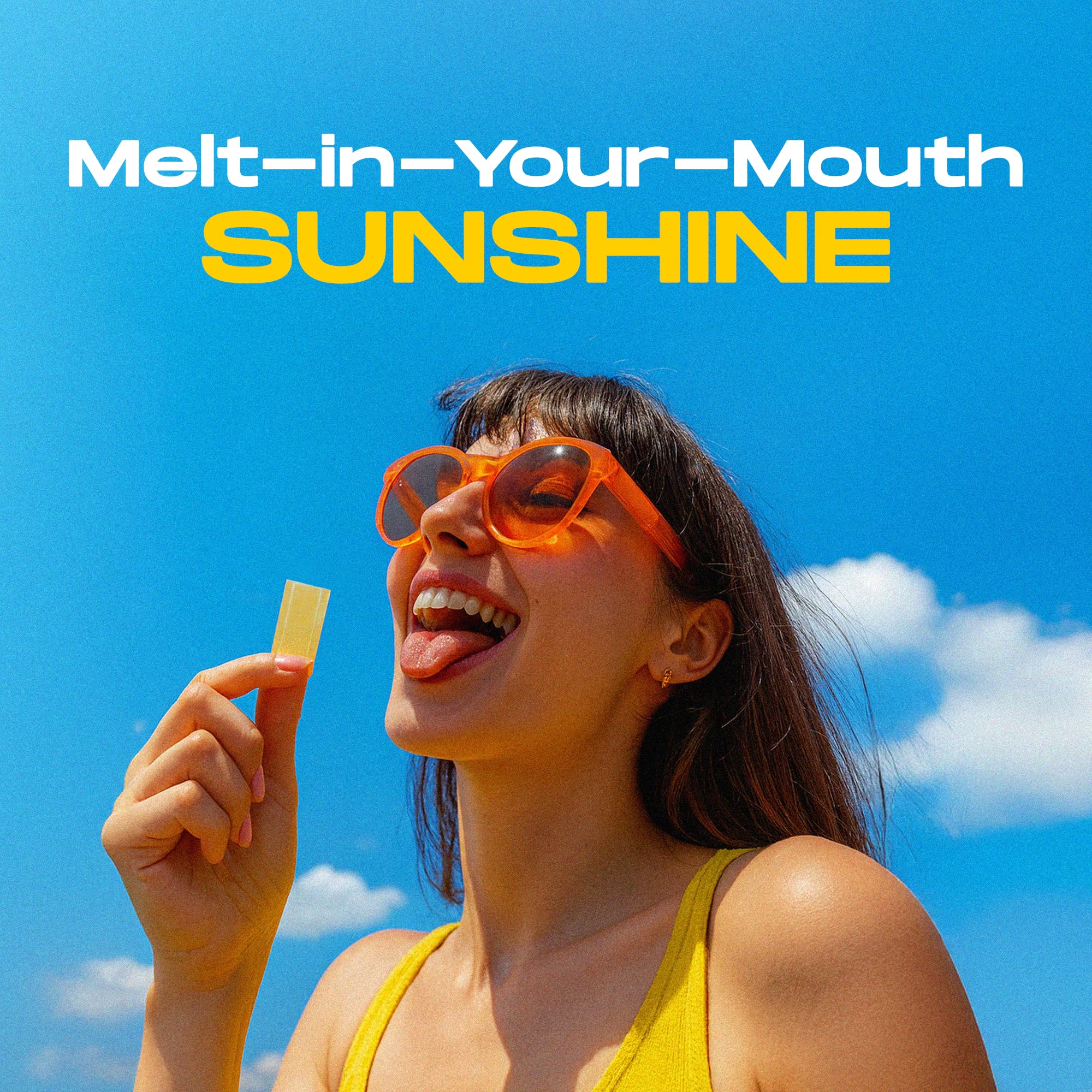 Orange-flavored D3 K2 strips on a white surface