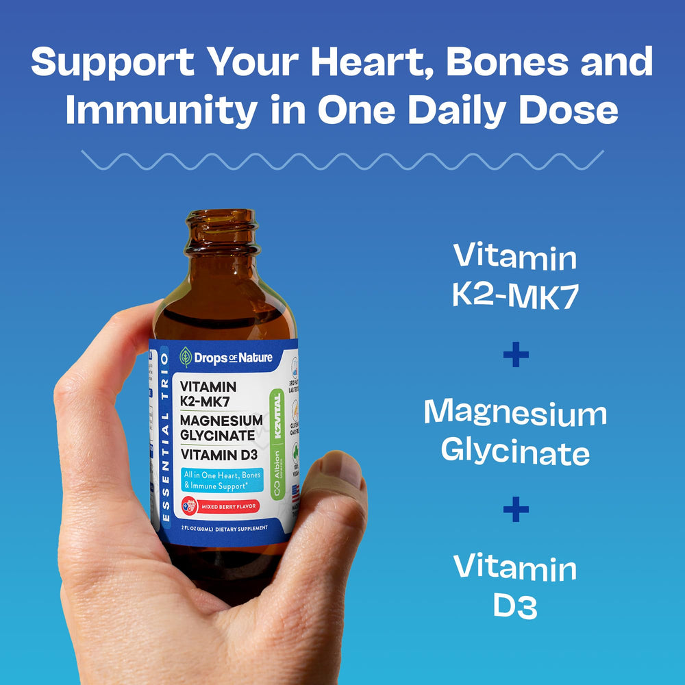 Close-up of dropper dispensing the liquid supplement with D3, K2 MK7 and magnesium glycinate