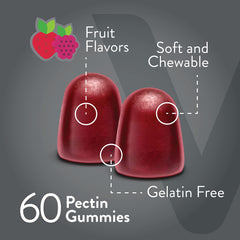 Assorted fruit-flavored gummies in bottle on white background