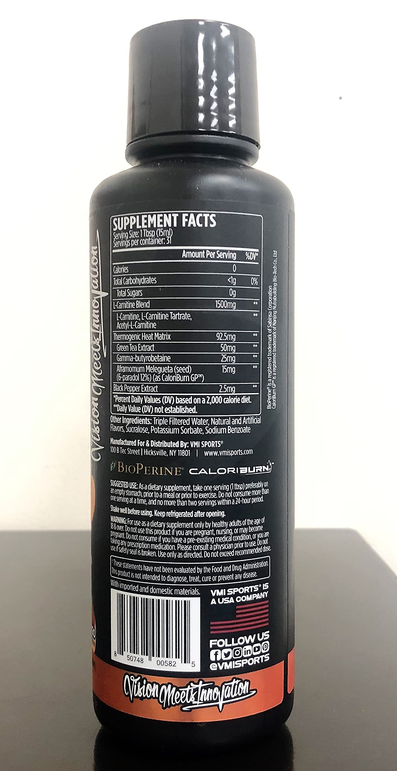 VMI Sports L-Carnitine 1500 Heat glass being mixed, signaling simple pre-exercise use.