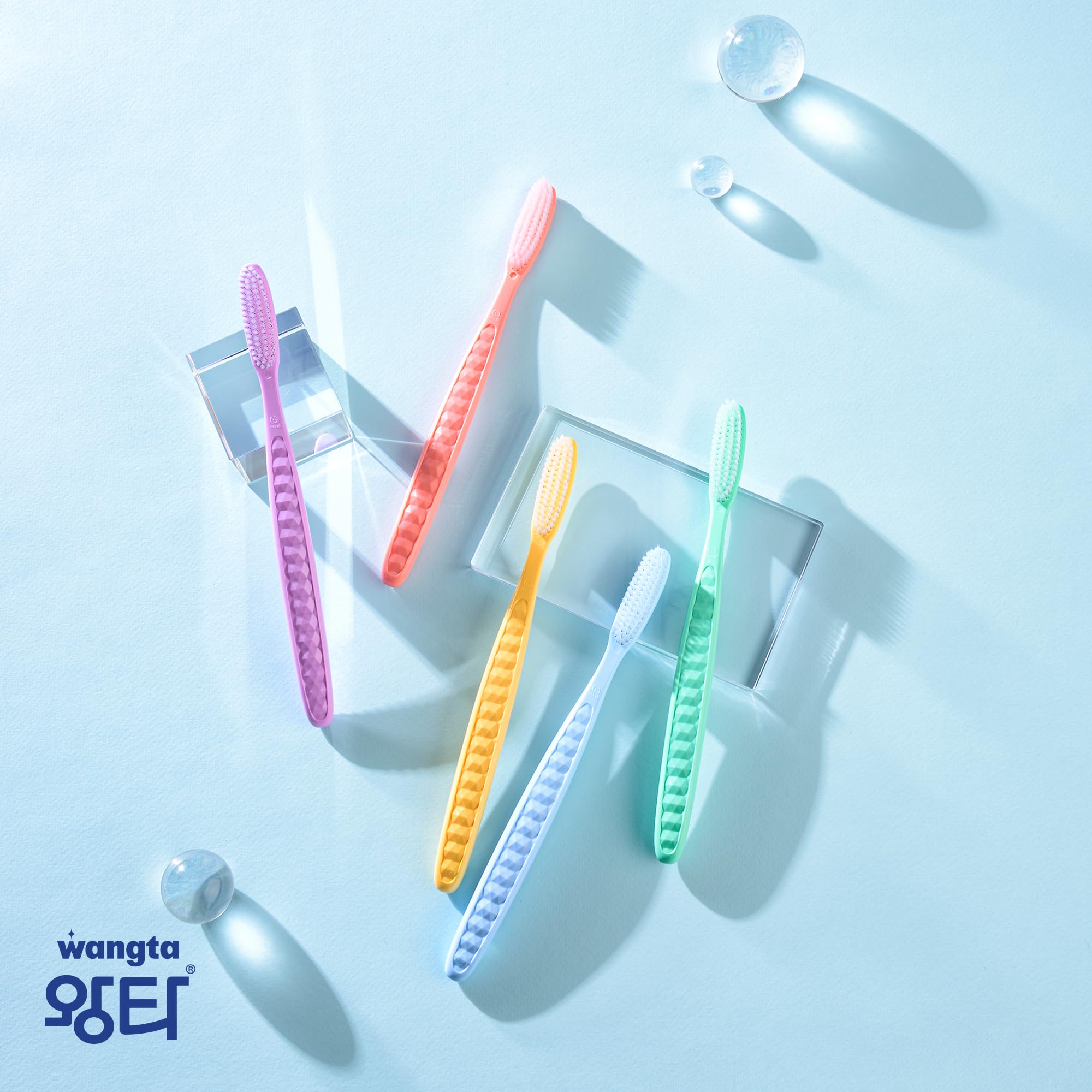 WANGTA toothbrush color options and crystal grip