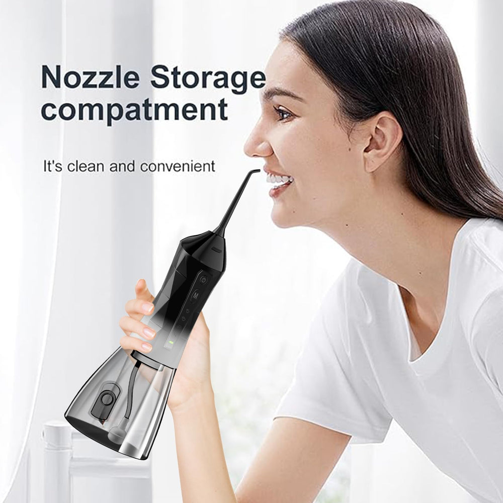 Ergonomic handle with nozzle attachments ready for use