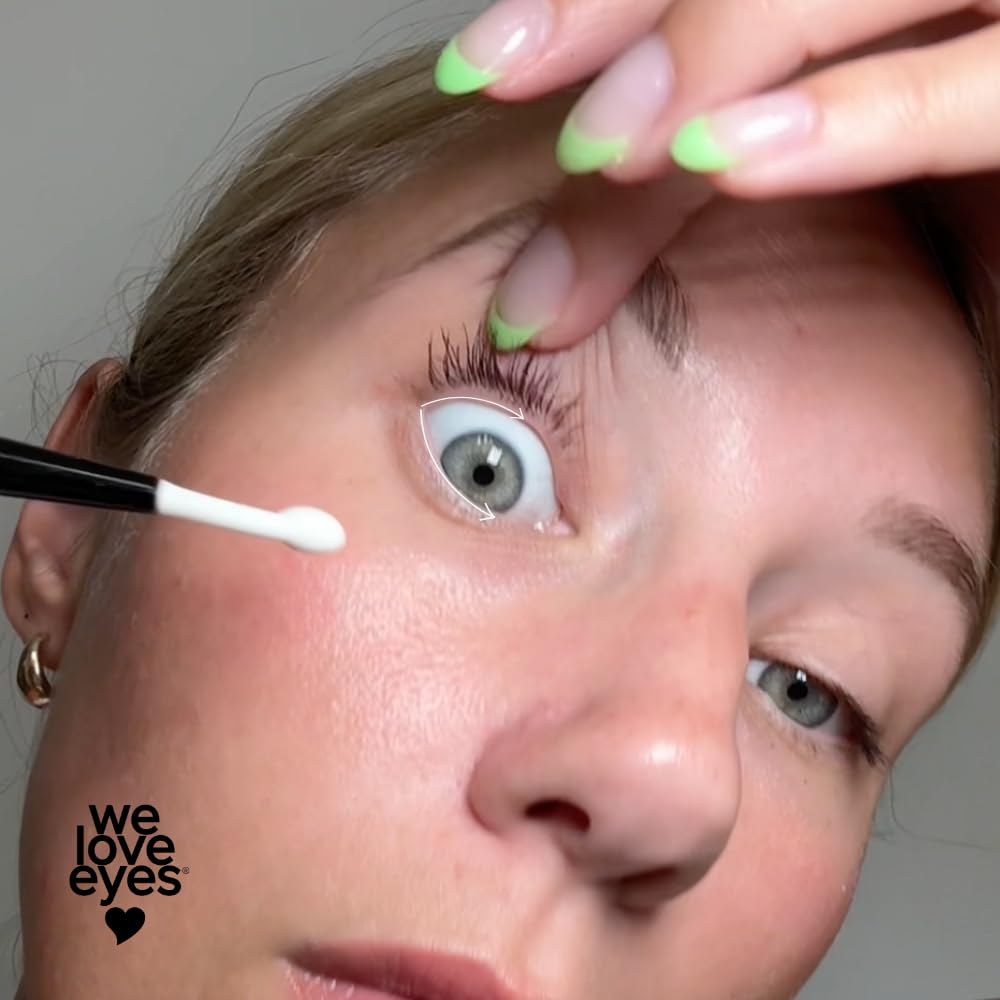 Brush in use for eyelid cleansing with cleansing oil