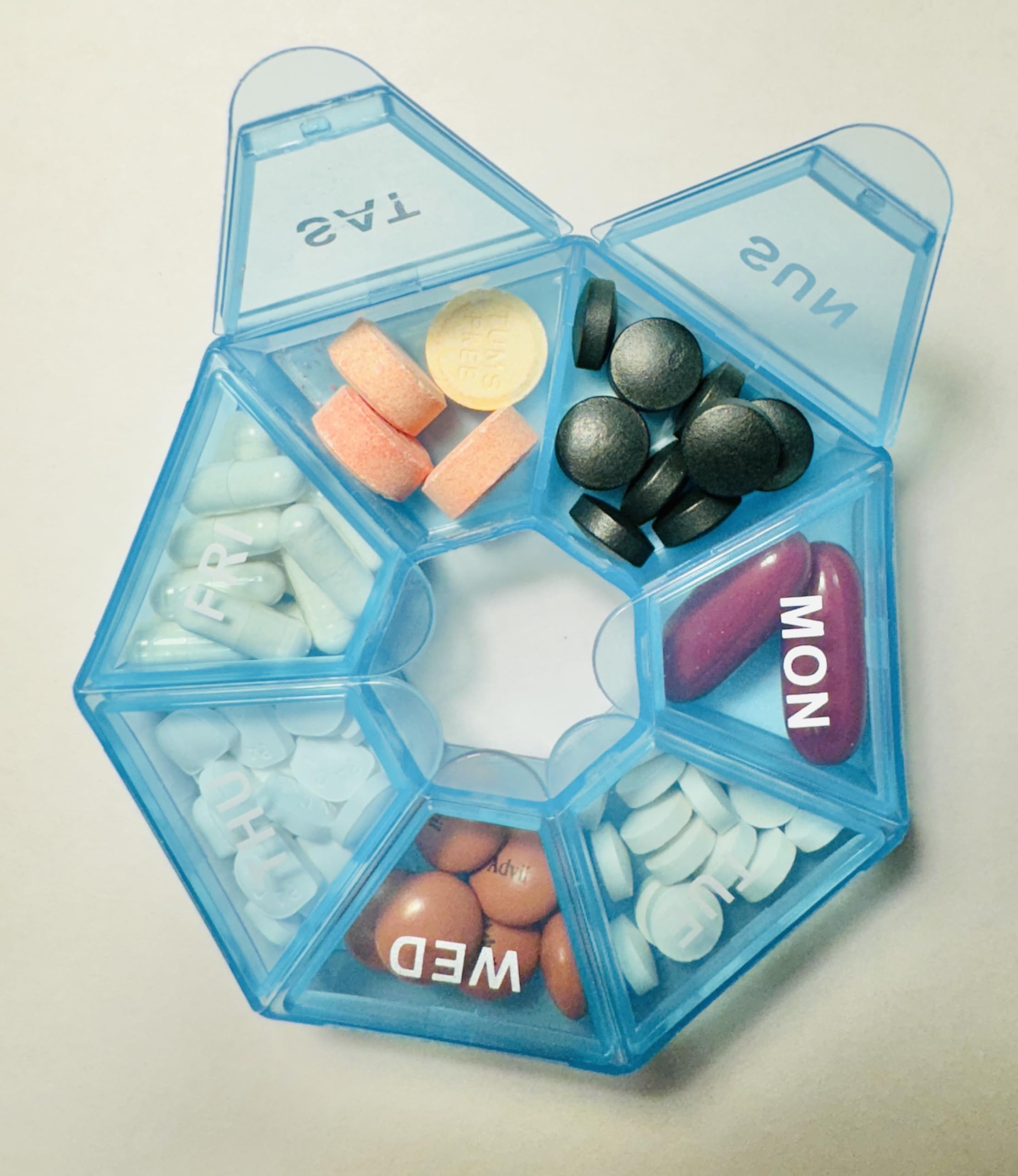 Bundle image showing softgel bottle and weekly pill organizer