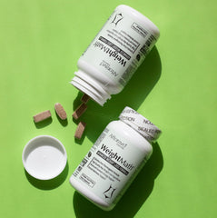Close-up of WeightMath capsules with ingredient visuals