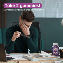 Assorted berry-flavored Dopamine Gummies arranged on a white surface